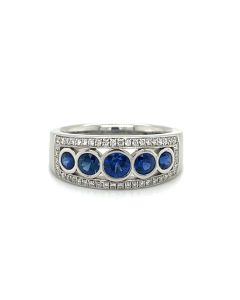 Platinum 0.71ct Blue Sapphire and 0.22ct Diamond half eternity Ring
